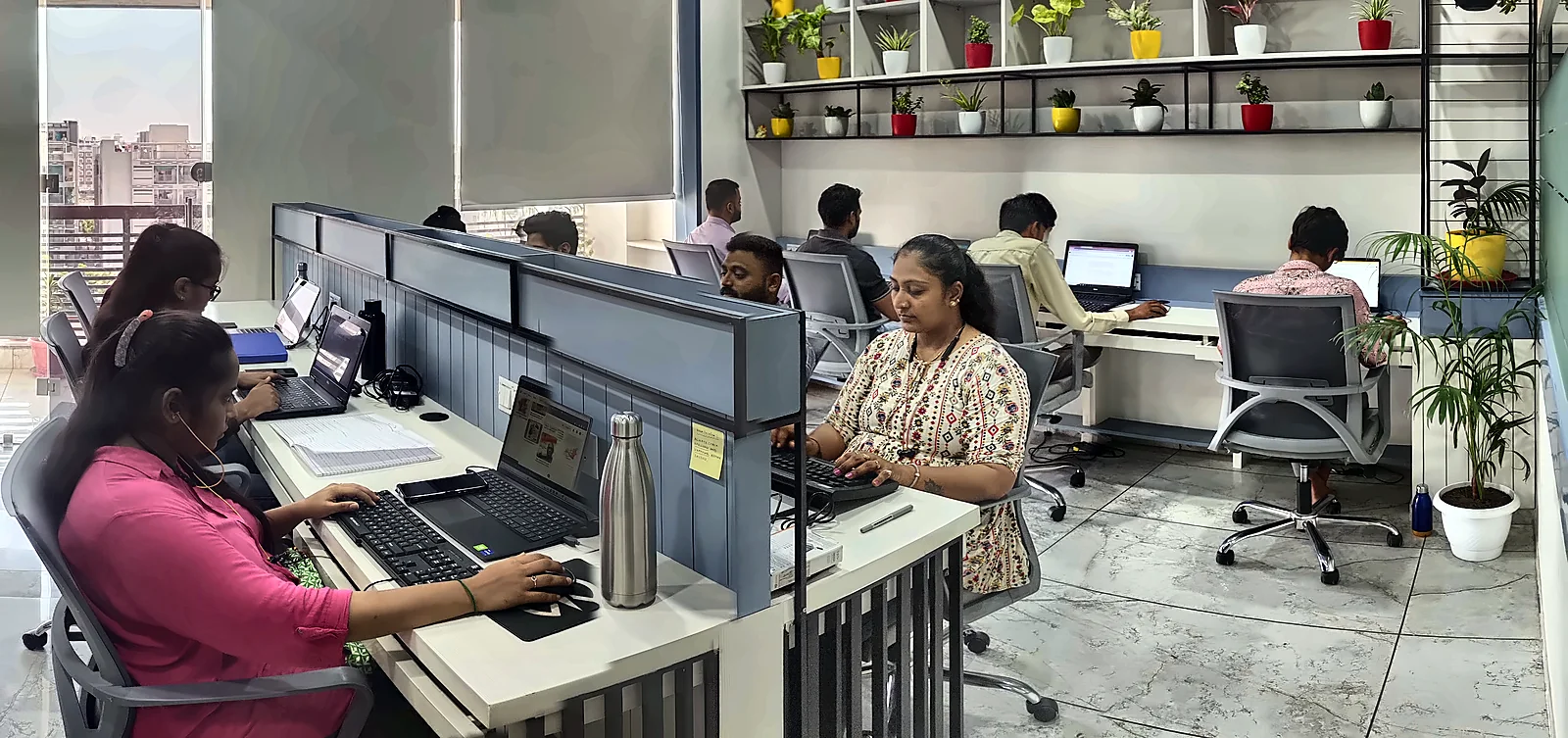 The Teciza team working in the Ahmedabad office
