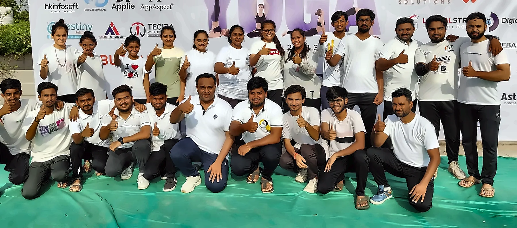 Teciza team members at an International Yoga Day event